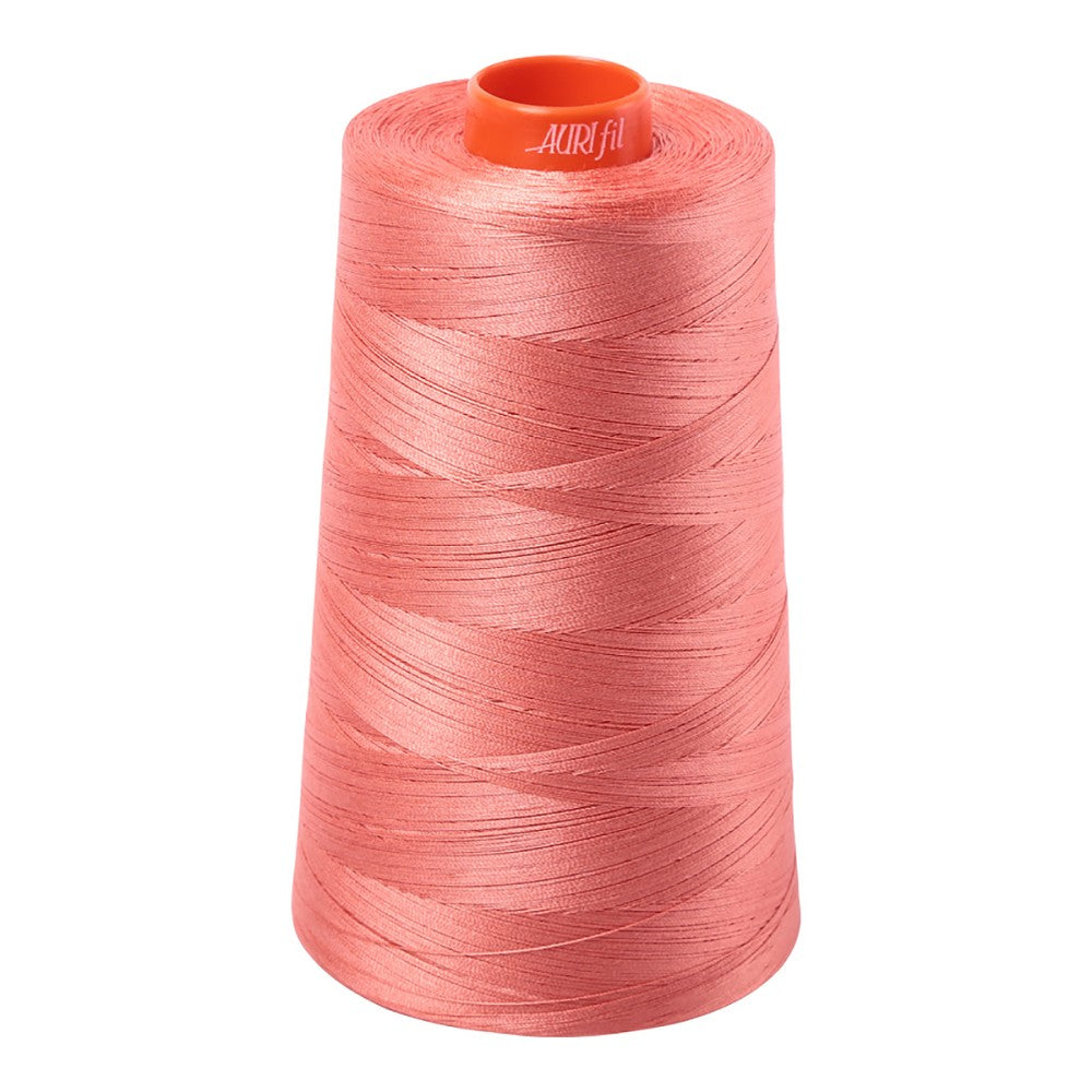 Aurifil 50wt cotton thread cone in Tangerine Dream 6729