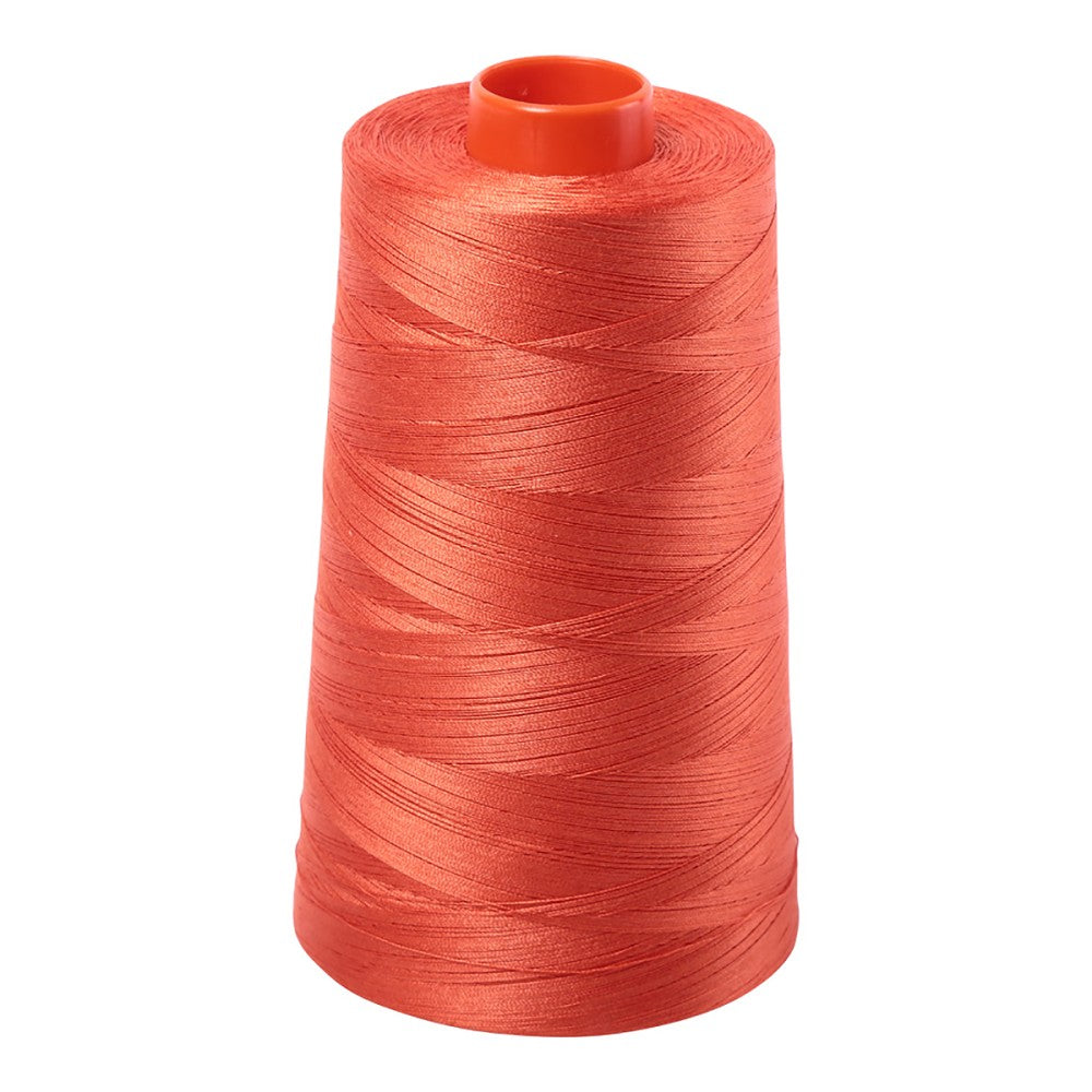 Aurifil 50wt cotton thread cone in Dusty Orange 1154
