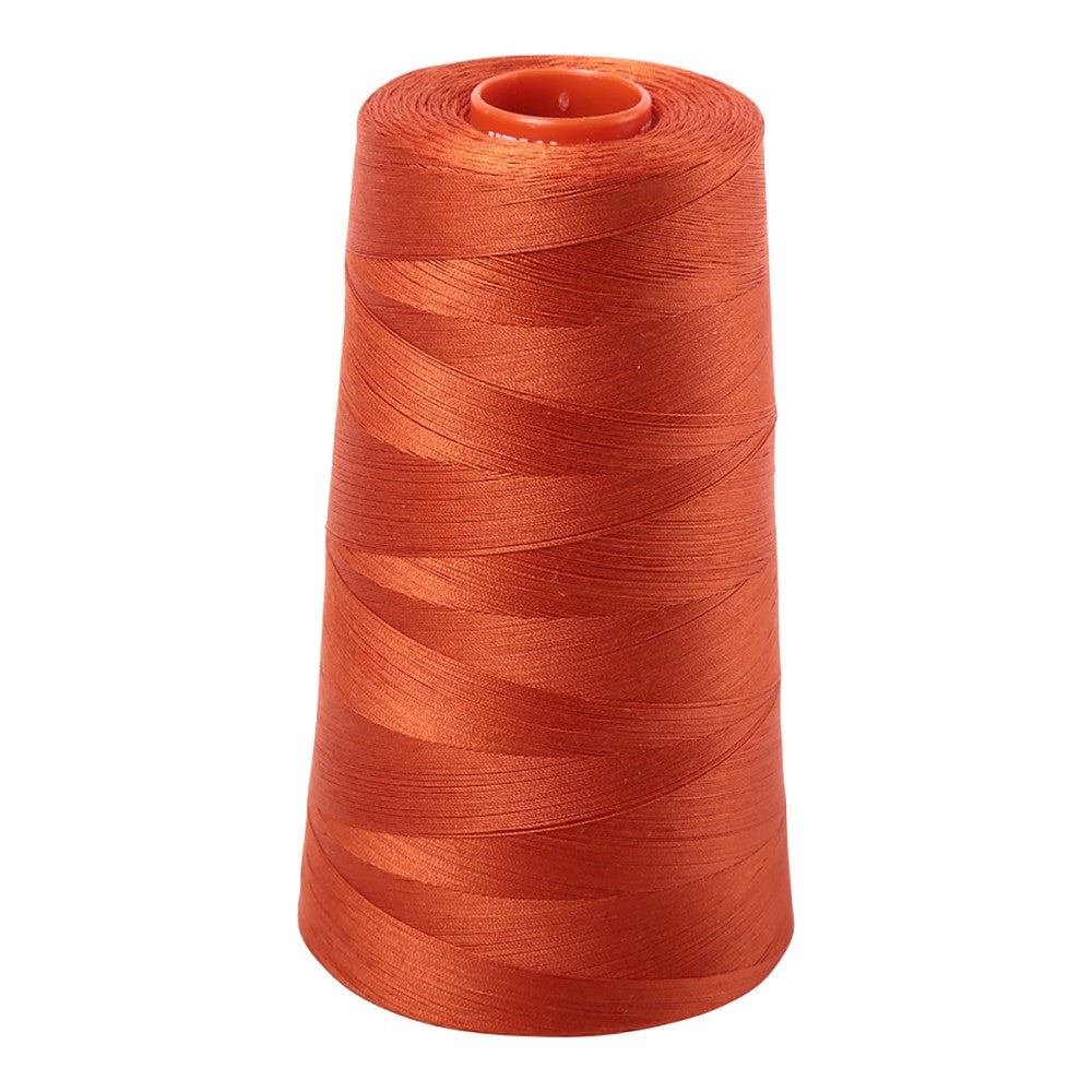 Aurifil 50wt cotton thread cone in Rusty Orange 2240