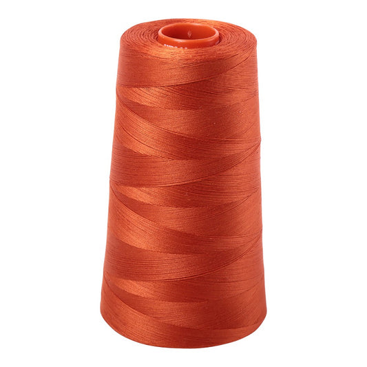 Aurifil 50wt cotton thread cone in Rusty Orange 2240