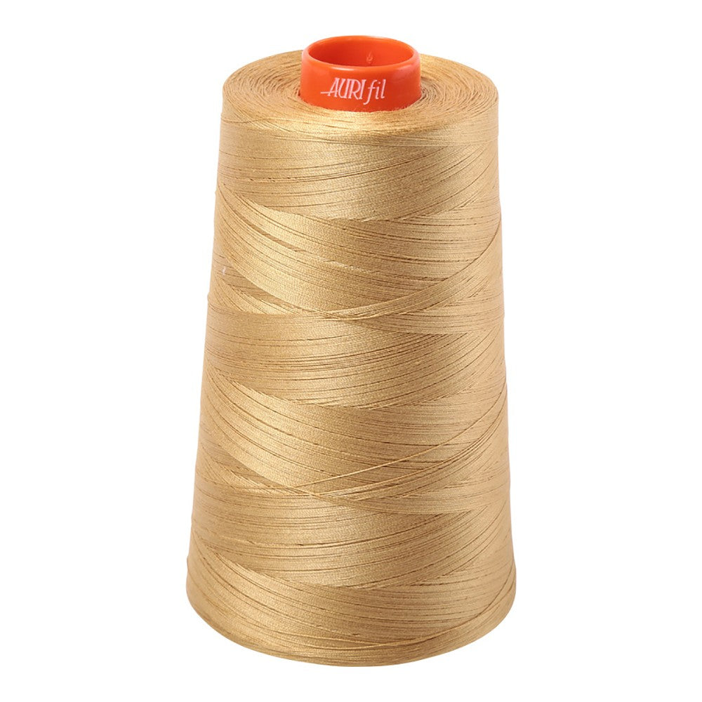 Aurifil 50wt cotton thread cone in Light Brass 2920