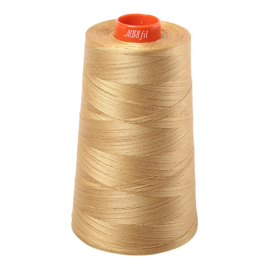 Aurifil 50wt cotton thread cone in Light Brass 2920