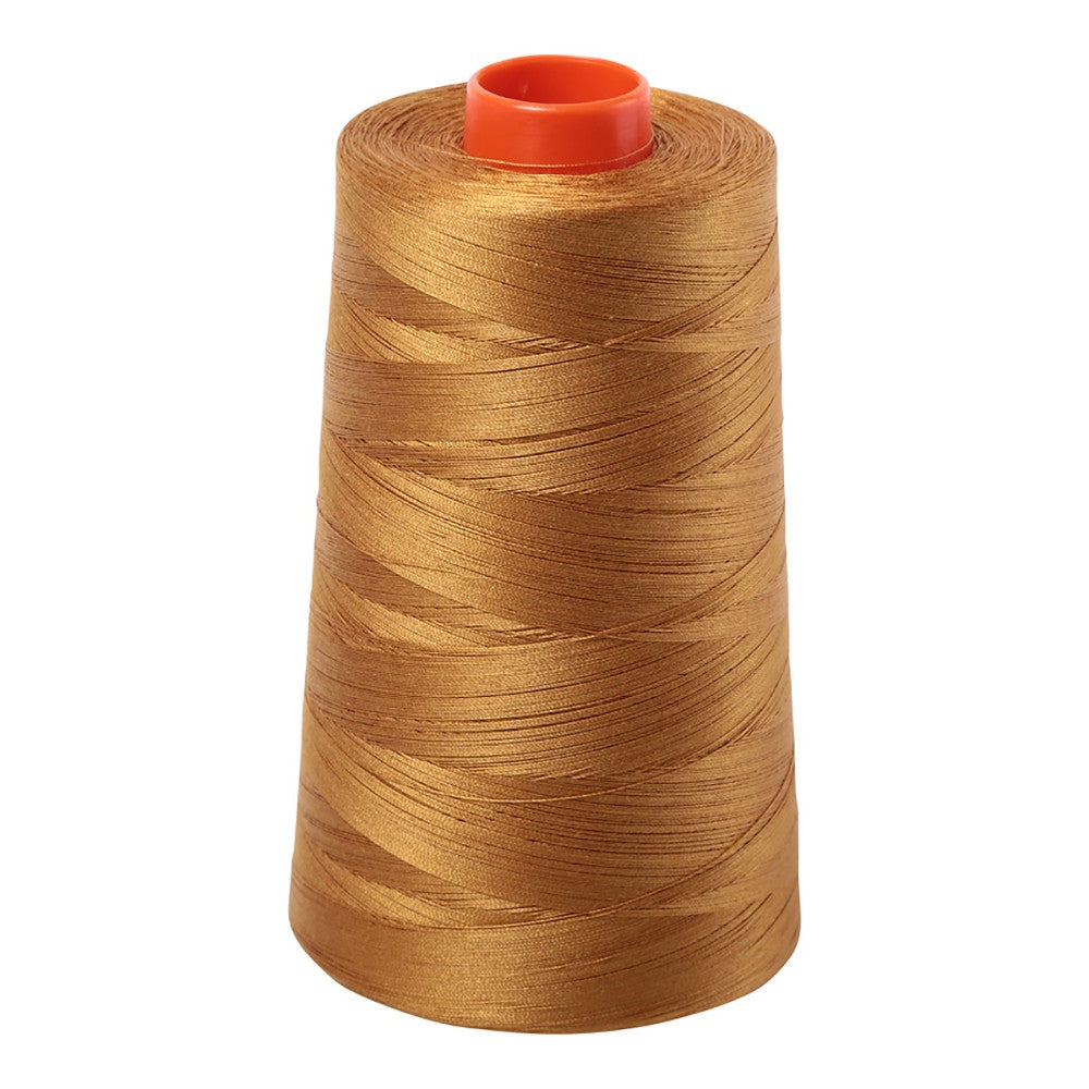 Aurifil 50wt cotton thread cone in Brass 2975