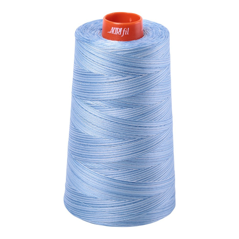 Aurifil 50wt cotton thread cone in Variegated Stone Washed Denim 3770