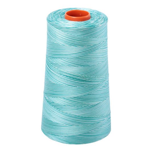 Aurifil 50wt cotton thread cone in Variegated Turquoise Foam 4654