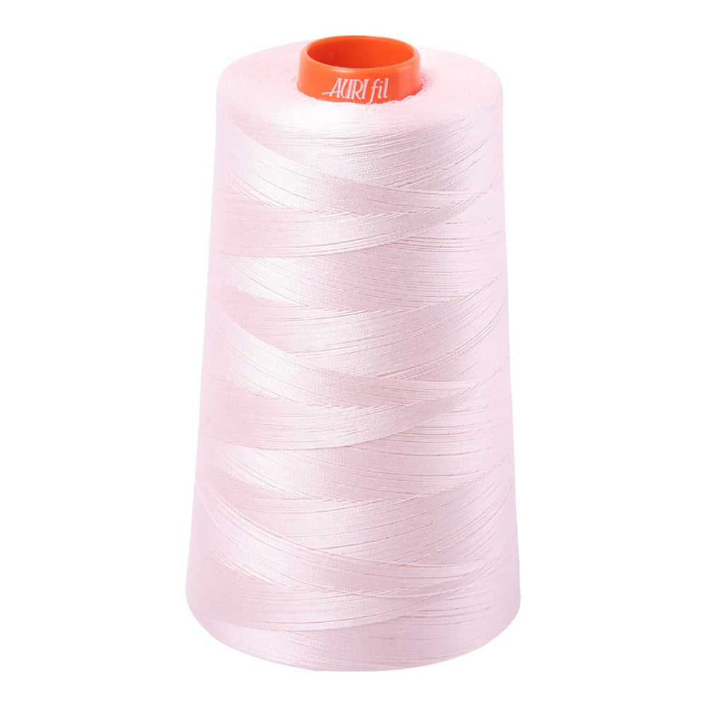 Aurifil 50wt cotton thread cone in Fairy Floss 6723