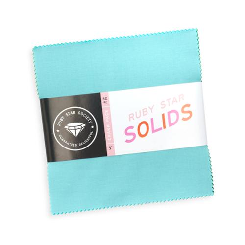 Ruby Star Solids Charm Pack of 5-inch solid fabric squares by Ruby Star Society for Moda