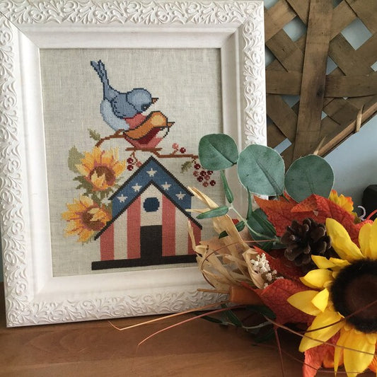 Birdhouse with Sunflowers